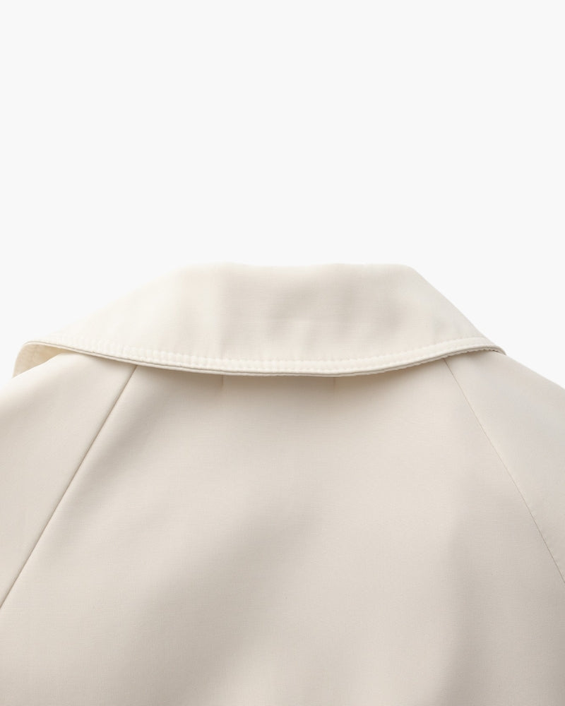 Close-up of material and construction details on women's Trench — Ardovena Lucca